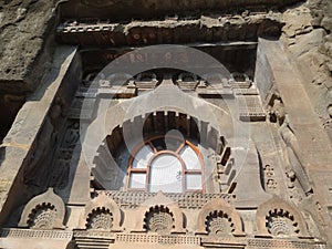 WORLD FAMOUS ANCIENT AJANTA CAVES ROCKCUT STRUCTURE WITH BEAUTIFUL DOOR DESIGN IN INDIA photo