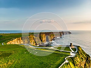 World famous Cliffs of Moher, one of the most popular tourist destinations in Ireland. Aerial view of known tourist attraction on