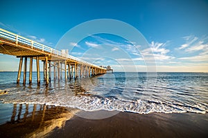 World famous Malibu Surfrider beach at sunset