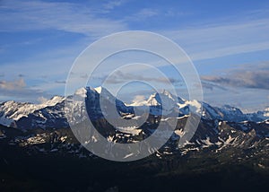 World famous mountain range Eiger, Monch and Jungfrau. View from Mount Brienzer Rothorn. Eiger North Face