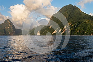 The World Famous Piton Mountains rise above the Caribbean Sea.