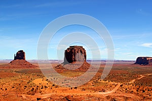 The world famous West Mitte Butte - East Mitten Butte and Merrick Butte in Monument Valley Park - beautfiful day with a clear blue