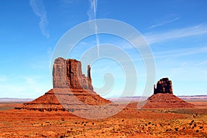 The world famous West Mitte Butte and East Mitten Butte in Monument Valley Park - beautfiful day with a clear blue sky to discover