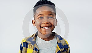 The world is full of adventure and excitement. Portrait of an adorable little boy posing against a white background.