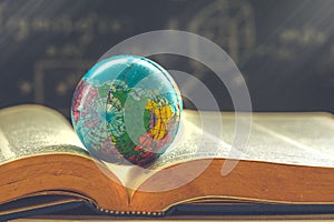 World globe on book. education school Concept photo