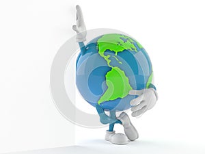World globe character leaning against a wall