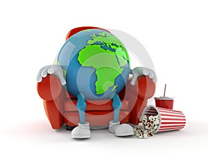 World globe character sitting in the cinema