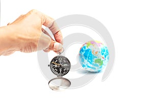 World globe and compass  over white background