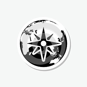 World globe with compass sticker icon isolated on gray background