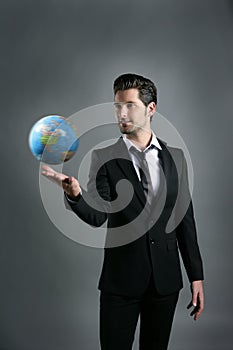 World globe map sphere in businessman hand