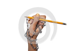 World Information Day -  chained female hand with yellow pencil on the white background