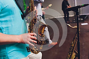 World Jazz festival. Saxophone, music instrument played by saxophonist player musician in fest. photo