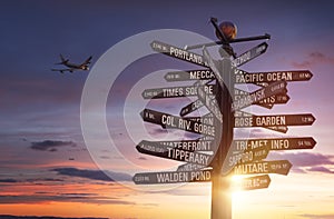 World Landmarks Signpost with colorful sky and free copy space