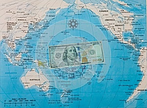 World map with dollar on the center. Suitable for economic illustration.