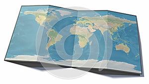 World map drawn on a folded sheet, planisphere leaning on a surface. Physical map