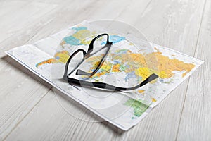 World map and glasses