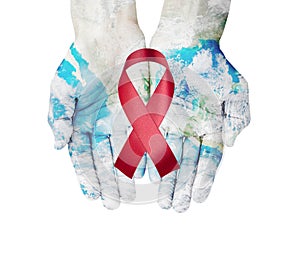 World map on hands with red ribbon on white background , world a