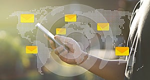 World Map Message Icons Man Hand Using Smartphone Background