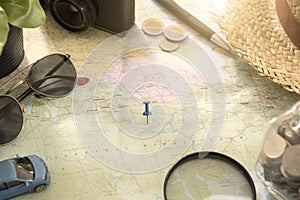 World map for planning vacation with other travel accessories