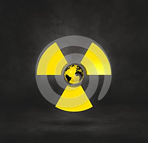 World map on Radioactive symbol. Black studio background