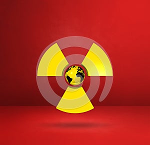 World map on Radioactive symbol. Red studio background