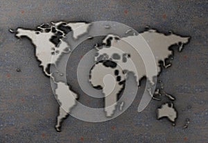 World map on rusty metal plate
