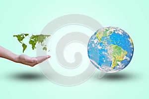 World map showing open hand with green leaves. World on a pastel background. color.Environment concept.Ecology concept.The