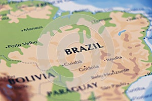 world map of south american continent and brazil in close up focus