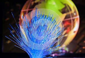 World map technology style against fiber optic