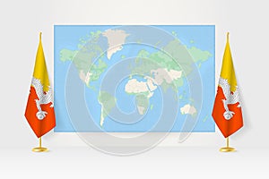 World Map between two hanging flags of Bhutan flag stand