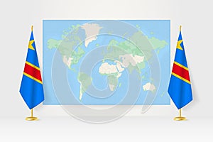 World Map between two hanging flags of DR Congo flag stand