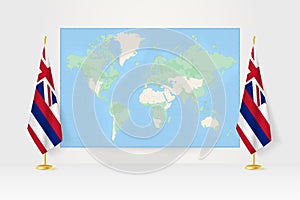 World Map between two hanging flags of Hawaii flag stand