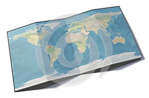 World map, Venezuela, drawn on a folded sheet, planisphere leaning on a surface photo
