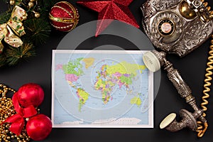 World map with vintage telephone on christmas background top view