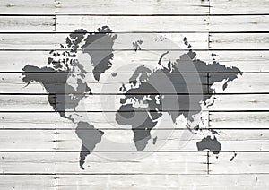 World map on white wooden wall background