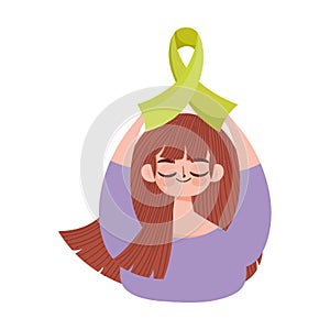 World mental health day, girl holding green ribbon