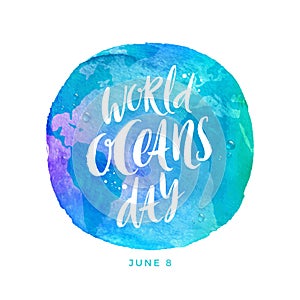 World oceans day emblem - brush calligraphy on a watercolor planet earth.