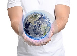 World in our hands. Man holding digital model of Earth on white background, closeup view