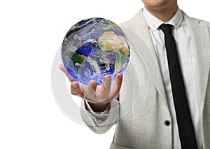 World in our hands. Man holding digital model of Earth on white background, closeup view