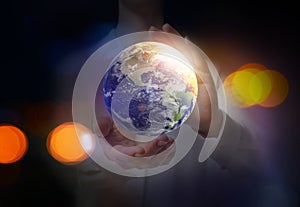 World in our hands. Woman holding digital model of Earth, closeup view