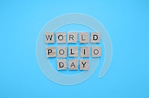 World Polio Day, minimalistic banner with the inscription in wooden letters