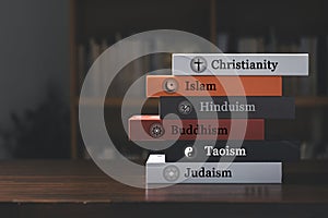 World religion symbols with english labeling on book cover. Signs of major religious groups and religions. Christianity, Islam,