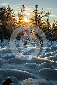 the world's largest stone river in the snow in the rays of the setting sun