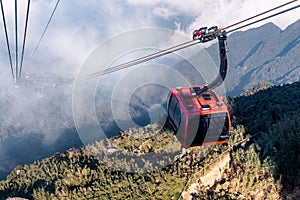 The world`s longest electric cable car go to Fansipan mountain peak the highest mountain in Indochina, Backdrop Beautiful view photo