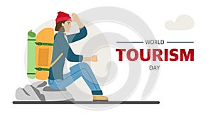 World Tourism Day banner for the holiday. A male traveler is engaged in hiking Hiking with a backpack A tourist in the