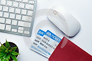 World travel business concept with tickets and passport and keyboard