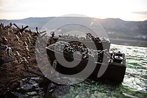 World War 2 reenactment D-day. Creative decoration with toy soldiers, landing crafts and hedgehogs. Battle scene of Normandy