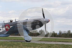 World War II Soviet fighter Yakovlev Yak-3 on runway at the CIAF - Czech international air fest on September 5, 2015 in Hradec