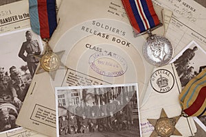 World War Two Soldier`s Release Book with medals