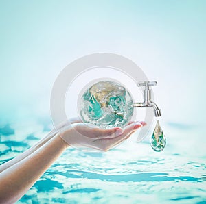 World water day, saving water campaign and environmental protection concept. Element of this image furnished by NASA